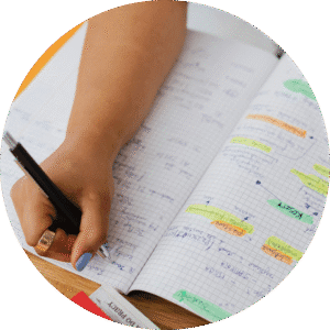 Organising Students BLOG - when should I start revising? Image of a student revising their notes