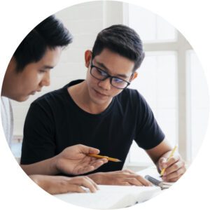 Organising Students BLOG - When should I start revising?  Image of a student working with a teacher