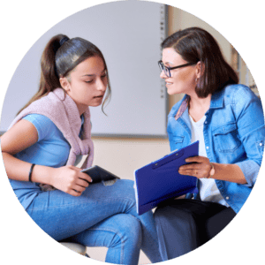 Organising Students BLOG - image of a student speaking to a teacher and getting feedback