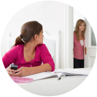 Organising Students - image of girl on phone getting distracted - Parents - be aware of nagging though